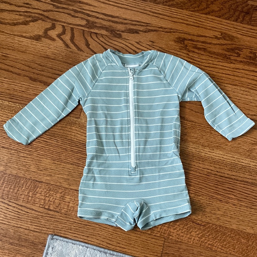 H&M 18M rash guard. The texturing is adorable. No pilling or stains. SPF